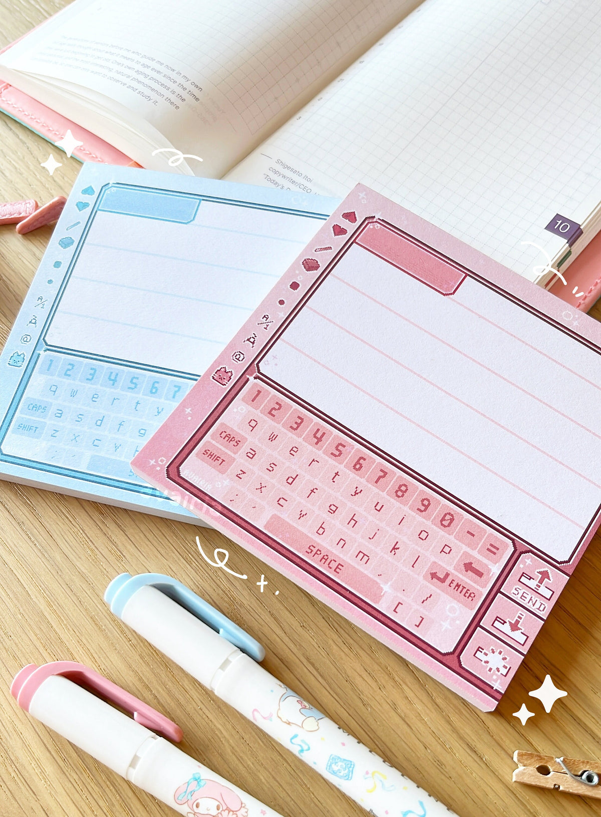 There are two memo pads, the left is blue and the right is pink. Both have a retro chat room design inspired by pictochat.
