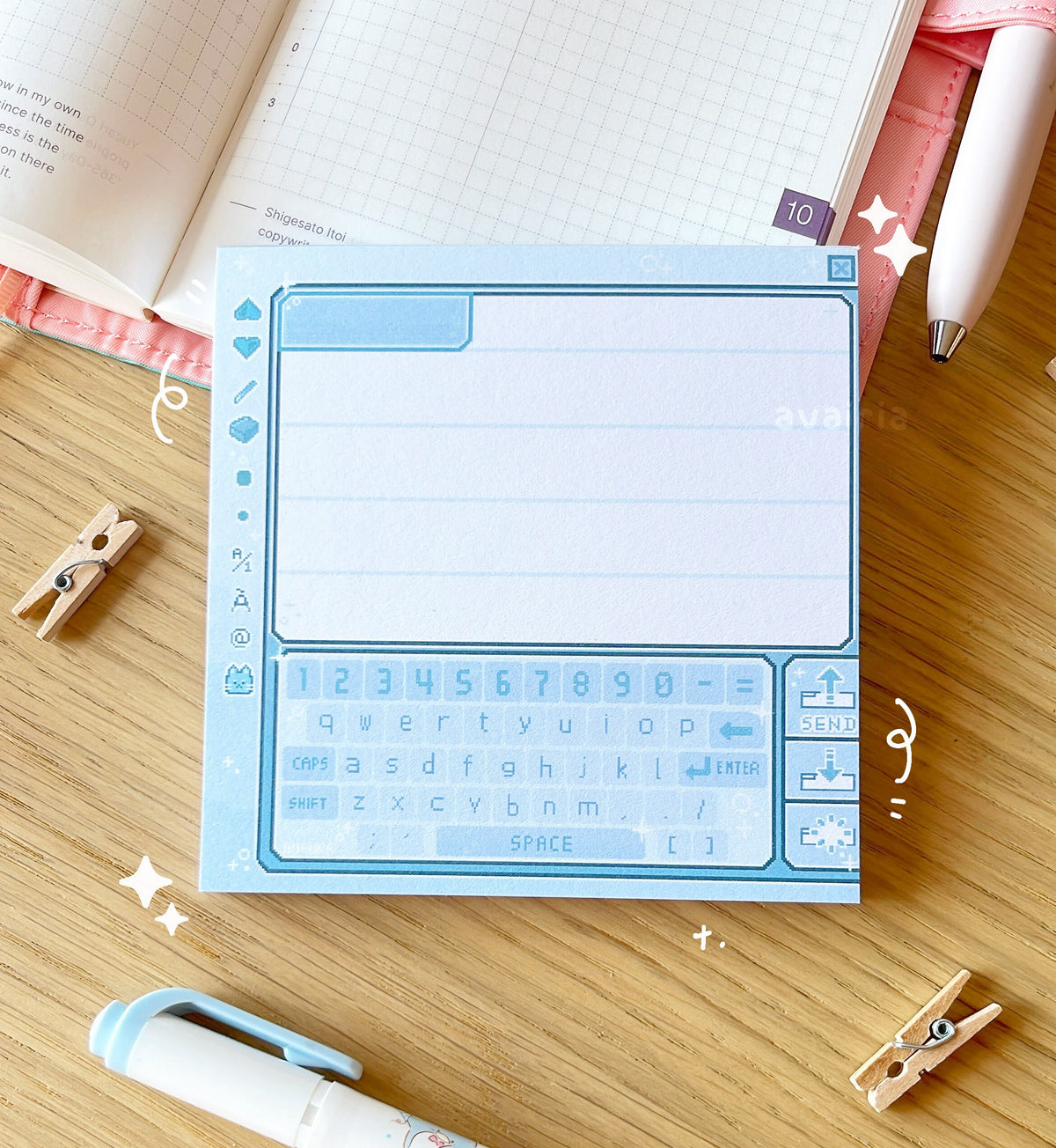 A blue memo pad with a retro chat room design inspired by pictochat.